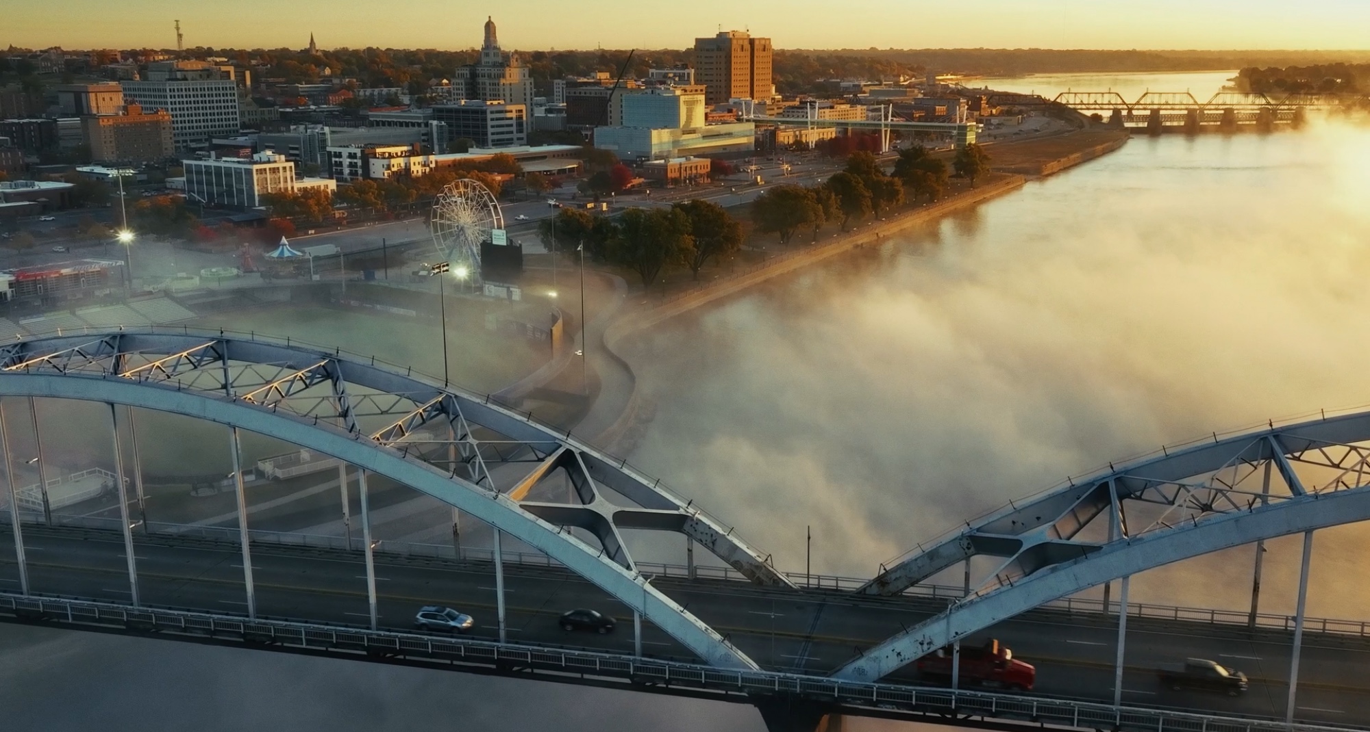 Golden light over downtown Davenport, Centennial Bridge, and the Mississippi River